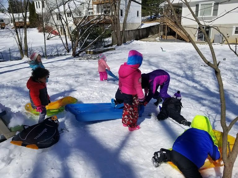 Children playing outdoors at Home4Kidz